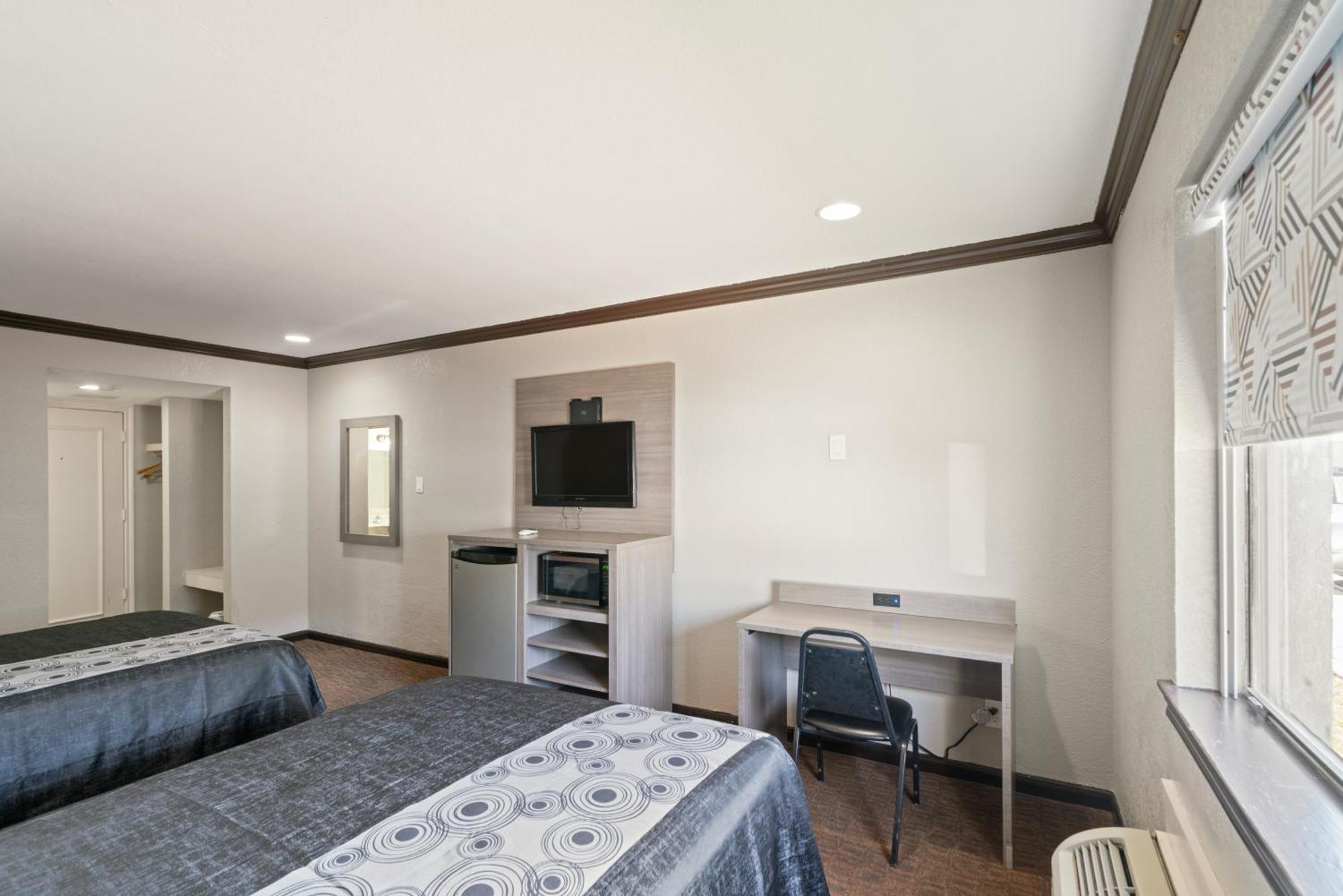 Americas Best Value Inn & Suites Бренем Экстерьер фото